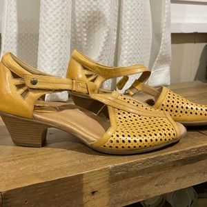 Earth.  Barely worn comfy low heels